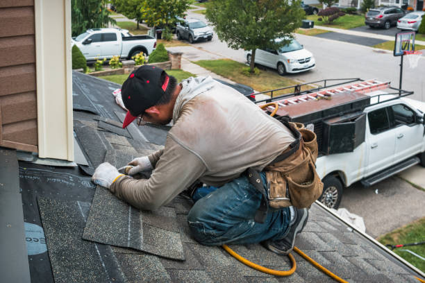 Professional Roof Replacement technician working in Yale, MI